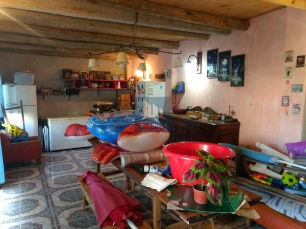 AMPLIA Y COMODA CASA CON QUINCHO, PILETA Y 4 HABITACIONES  -LLAVALLOL-